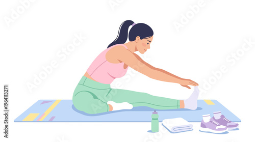 Woman stretching on yoga mat with fitness accessories.
