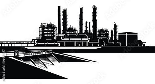 Industrial complex with refinery structures against a bright sky silhouette