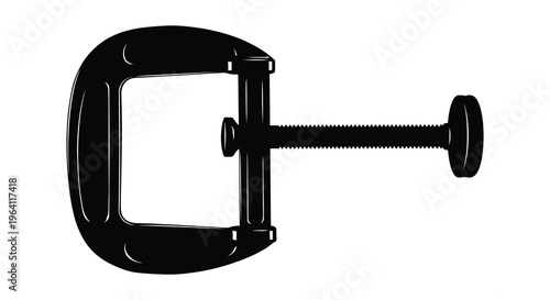 A stark black clamp tool isolated on a white background silhouette