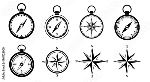 A collection of various compasses and navigation tools are displayed
