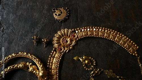 Gold prices in India are significant as an economic indicator and cultural cornerstone. As the largest consumer, the rising prices of old, vintage, expensive Indian-style gold jewelry. shiny necklace.