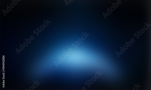 A blurry blue light in a dark room