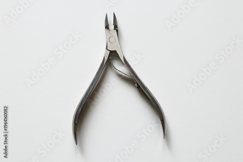 Cuticle and hangnail nippers on a white background for nail care, skin care