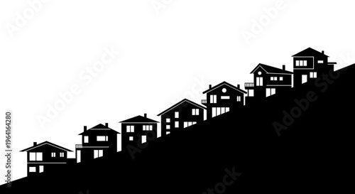 Silhouette of Houses on a Hillside.