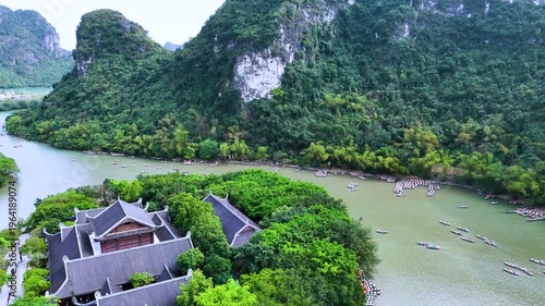 Aerial view of Trang An scenic area with boat cave tours near Ninh Binh, Vietnam