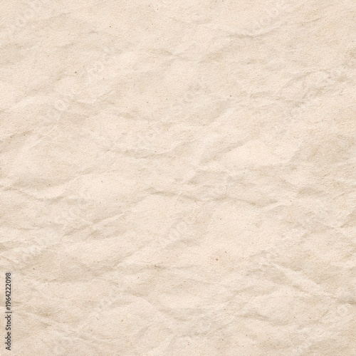 Paper texture close-up with creases and wrinkles, recycled rough light brown background.