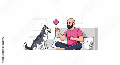 Man playing fetch with husky dog indoors