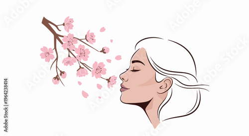 Woman enjoying the scent of blooming cherry blossoms