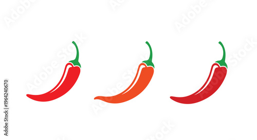 Set of three chili peppers in a row featuring two red ones on the ends and an orange one in the middle on a white surface.