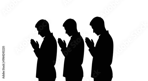 Muslim men praying in silhouette.