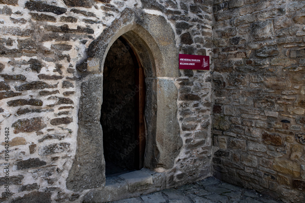 Fototapeta premium The thick stone walls of the Suceava fortress, a medieval fortress where Stephen the Great, the ruler of Moldavia, reigned, Romania, Europe