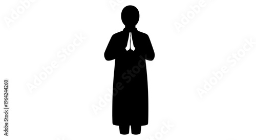 Silhouette of a praying person.