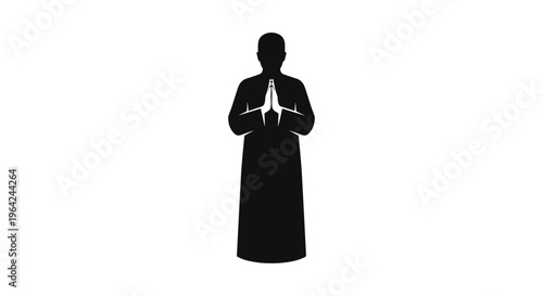 Silhouette of monk holding star.
