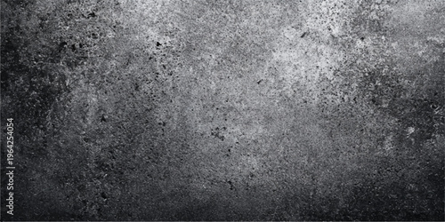 An aged dark grunge metal background featuring a rough textured grey concrete wall surface with dirty vintage cement patterns for an antique industrial design backdrop