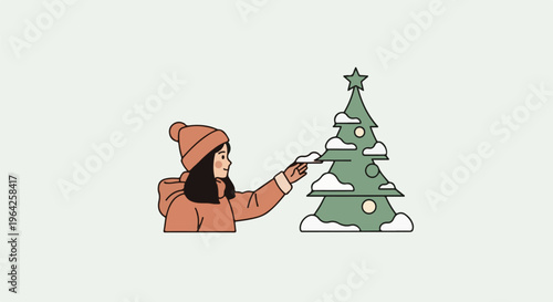 A child in winter attire decorates a festive green tree with white snow accents