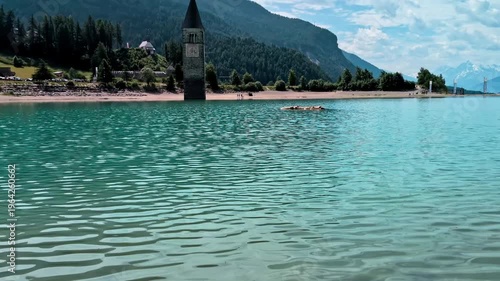 Sunken Bell Tower of Alt Graun in Lake Reschen South Tyrol Italy 4K