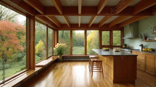 Contemporary Kitchen with Natural Light and Scenic Views in Earthy Tones Surrounded by Autumn Foliage