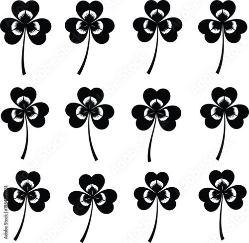Black shamrock clover pattern with white inner details on white background three leaf clover repetition