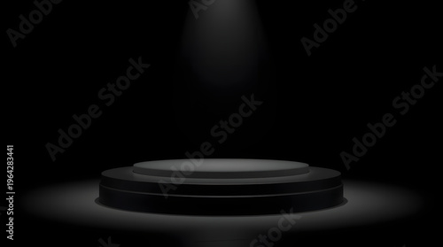 Spotlight illuminates a circular stage in a dark room, emphasizing focus and performance