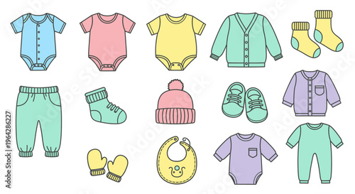 Baby clothes and accessories laid out 1.