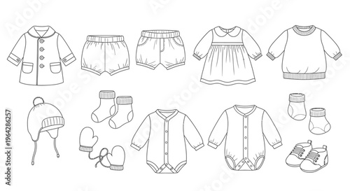 Baby clothes and accessories laid out 11.