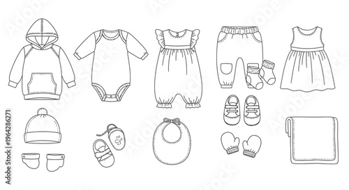 Baby clothes and accessories laid out 17.