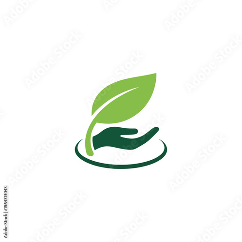 Green leaf growing from caring hand symbol.