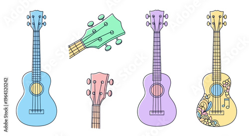 Colorful ukuleles on white background.