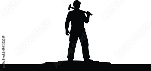 Silhouette of a Strong Construction Worker Wearing a Hard Hat and Carrying a Sledgehammer for Industrial Labor and Building Projects