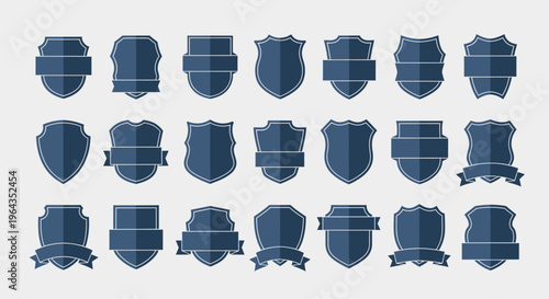 Collection of various navy blue shield and badge shapes with ribbon elements, suitable for emblems and crests