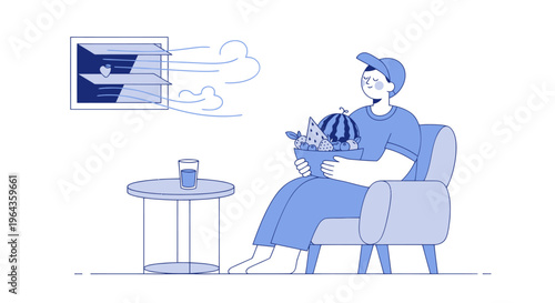 Man sitting in chair with laptop.