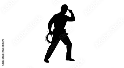 Silhouette of a construction worker saluting