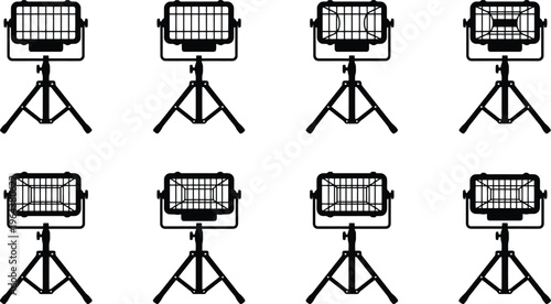 Set of eight black silhouette floodlights on tripods with transparent backgrounds spotlight lighting