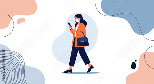 Professional woman wearing a face mask walks and uses her smartphone while carrying a handbag against a modern abstract background.