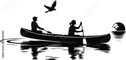 Canoe paddlers with bird in flight over lake