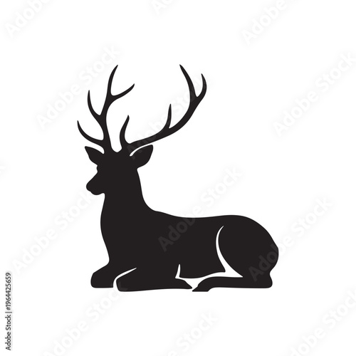 Black silhouette of a deer with large antlers lying down on white background