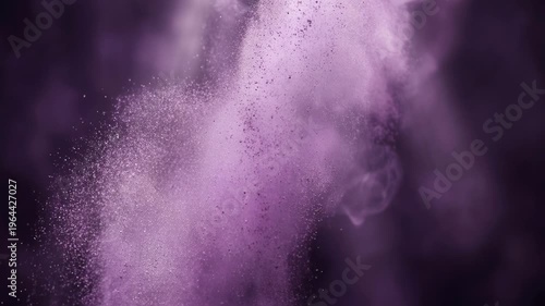 Purple powder explosion forming abstract vibrant pattern concept. Purple powder explosion with dynamic particles and smoke on dark background for abstract design