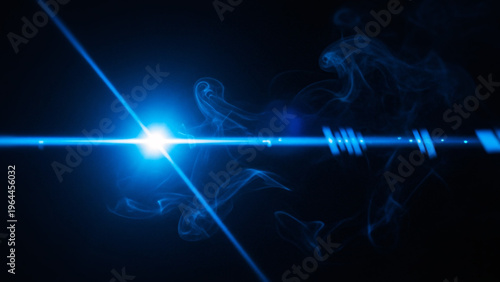 暗闇に輝く青いレンズフレアとレーザービームの抽象的な背景素材