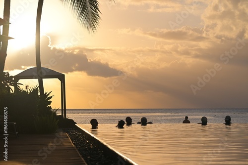 sunset near the beach on ingfinity pool
