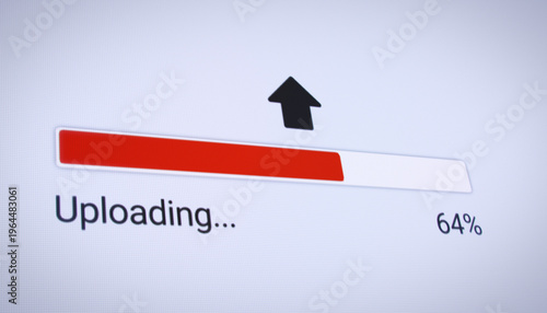 Fotografija Illustration of the process of uploading file from the Internet on a computer monitor screen