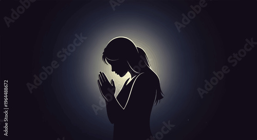 Silhouette of a woman in prayer with a halo effect around her head
