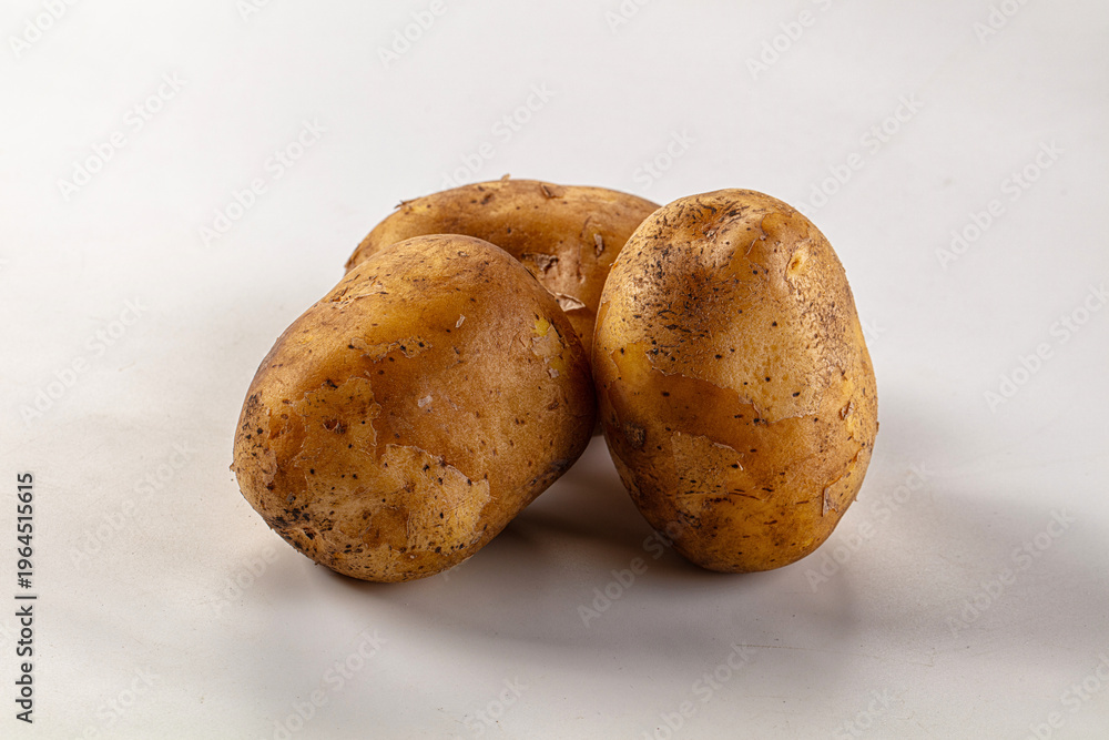 Fototapeta premium Raw potato heap for cooking