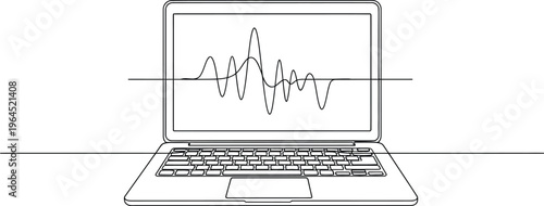 A laptop computer shows a fluctuating sound wave or complex signal graph displayed across its illuminated internal screen in a stark.