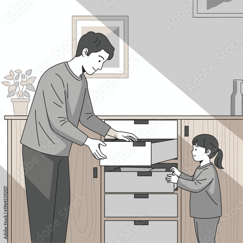 Father and daughter organizing drawers together.