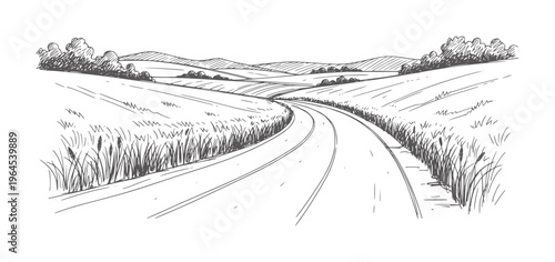 Winding country road through grassy fields and rolling hills landscape nature travel