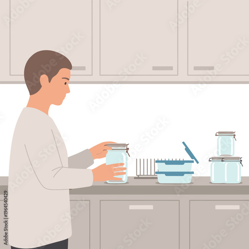 Man organizing kitchen containers for food storage.