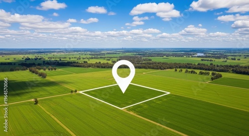 Land plot with location pin in green field