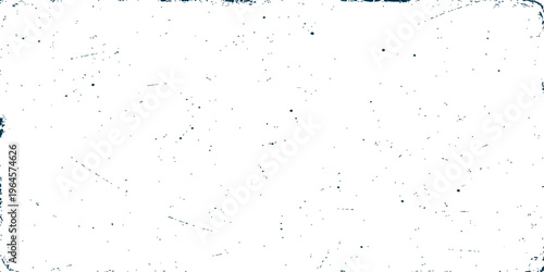 Distressed white background with black spots and scratches for a vintage grunge effect.