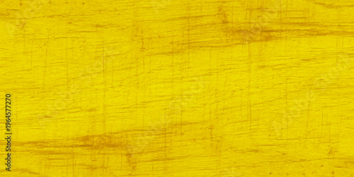 Vivid yellow wood texture with natural grain and distressed aged surface; bright golden timber background for design