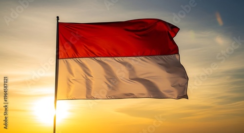 Indonesian flag waving at sunset with golden sky, dramatic patriotic atmosphere, warm glowing light highlighting national pride and symbolic identity